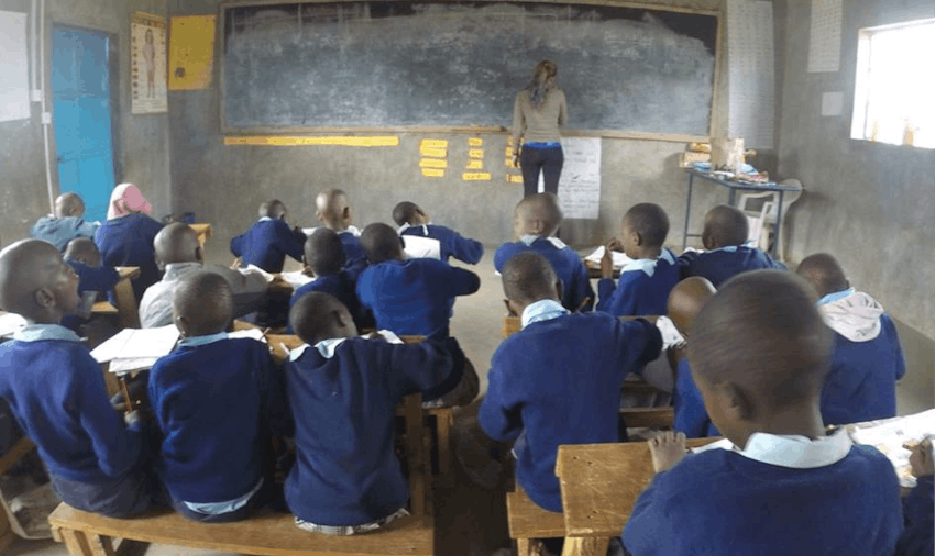 IVHQer Volunteer of the Year volunteering in the classroom in Kenya