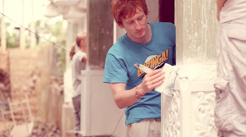 A volunteer works on a temple renovation project in Sri Lanka with IVHQ