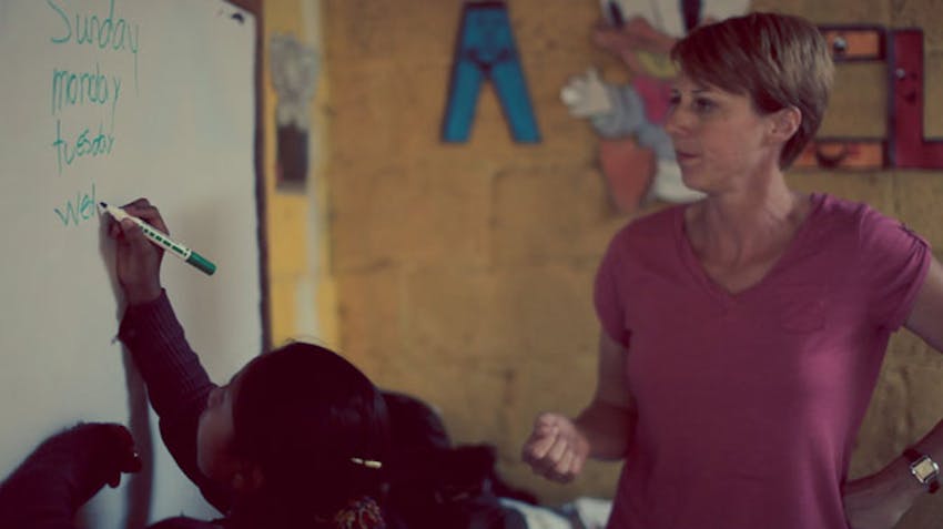 Senior IVHQ volunteers teach english volunteer abroad with International Volunteer HQ