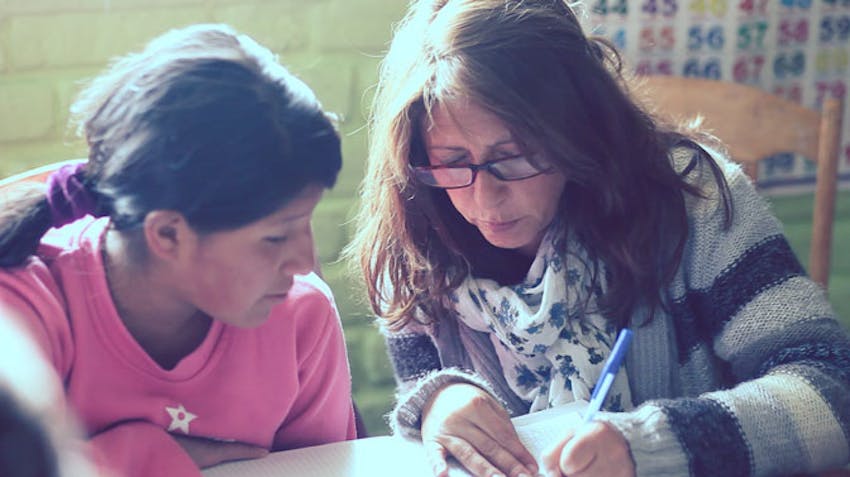 Volunteer parent teaching in Peru, Cusco with IVHQ