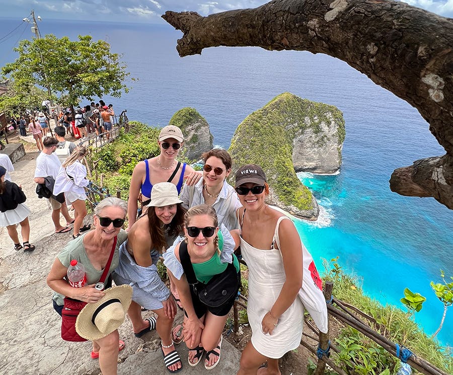 A group of mixed ages IVHQ volunteers exploring beautiful site in Ubud, Bali on the weekend
