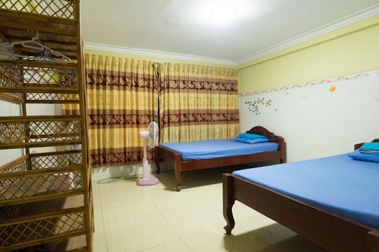 Volunteer house bedroom in Cambodia with IVHQ