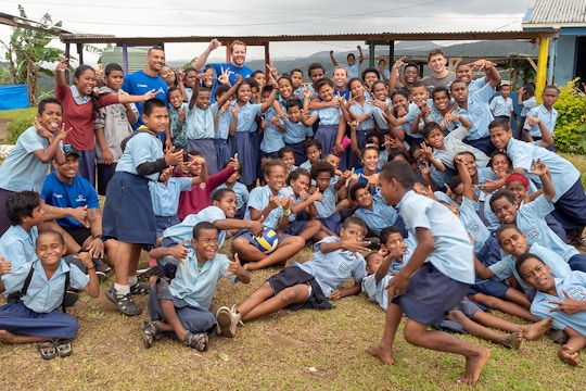 Volunteers and children on the Teaching in Fiji with IVHQ