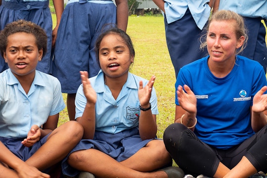 IVHQ Volunteer with children on the Teaching in Fiji