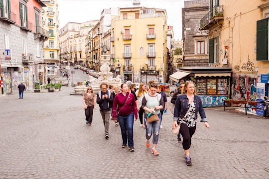 IVHQ volunteers walking to their project in Naples, Italy with IVHQ