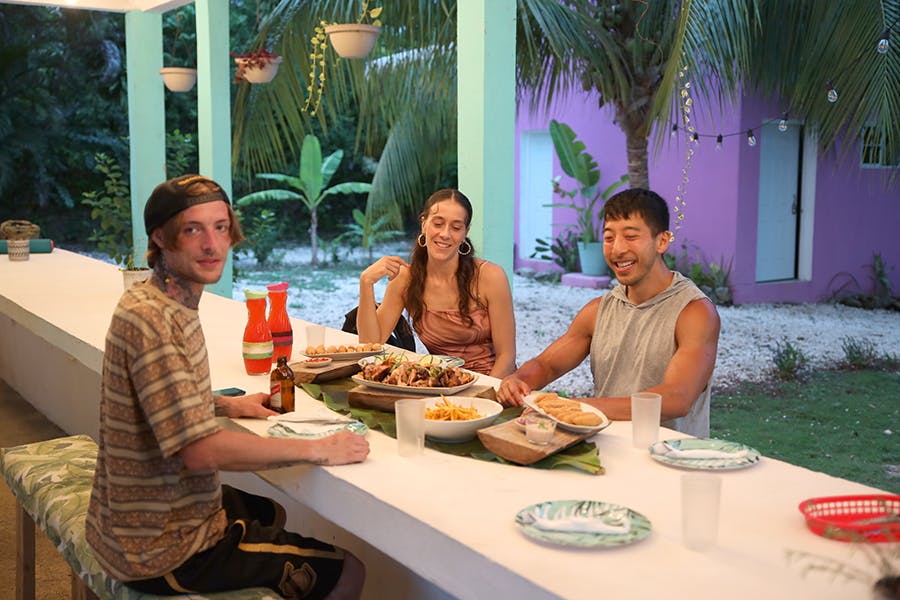 IVHQ volunteers enjoying an add on bbq dinner in Jamaica