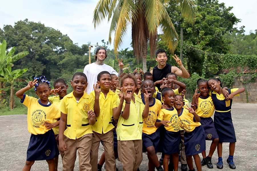 IVHQ volunteers with kids at the Jamaica Sports Development project
