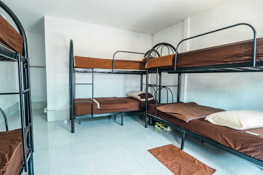 Volunteer house bedroom in Laos with IVHQ