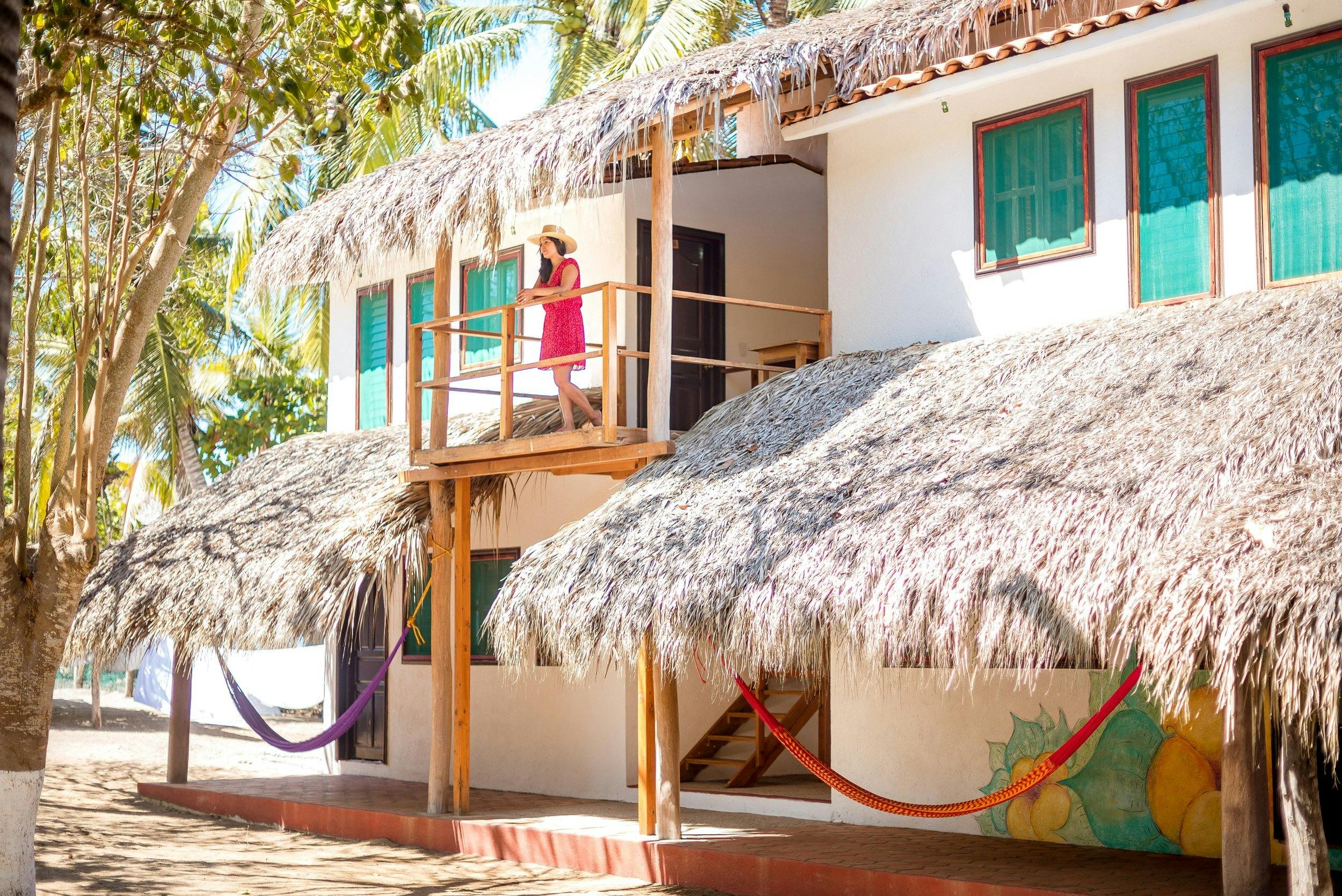 Accommodation in La Ventanilla, Mexico. Featuring a balcony and a colorful mural on the wall.
