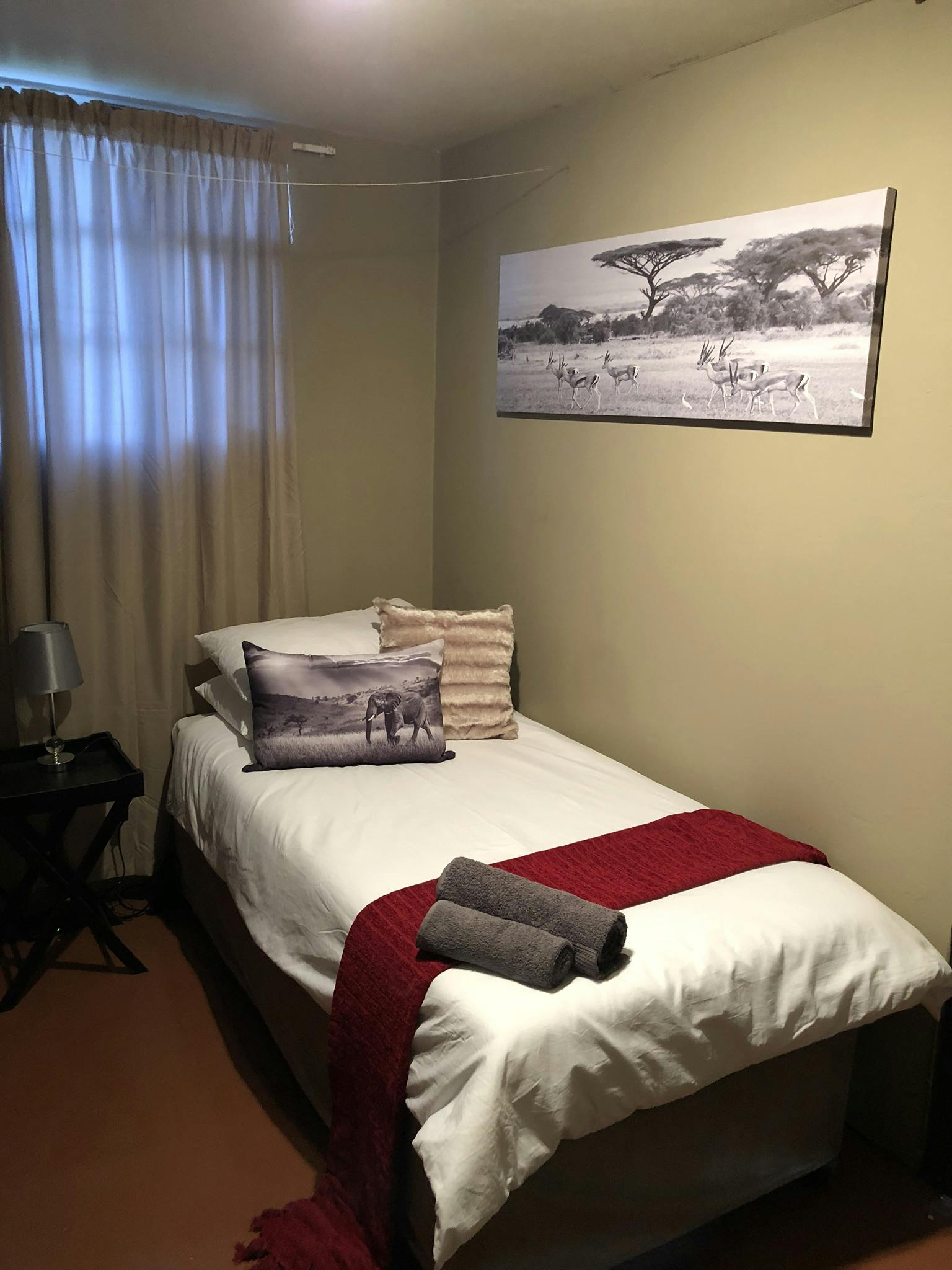 IVHQ wildlife conservation volunteer accommodation single bedroom upgrade bed in Kruger National Park, South Africa