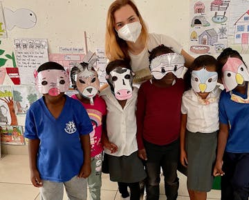IVHQ volunteer creating masks on the South Africa Childcare project