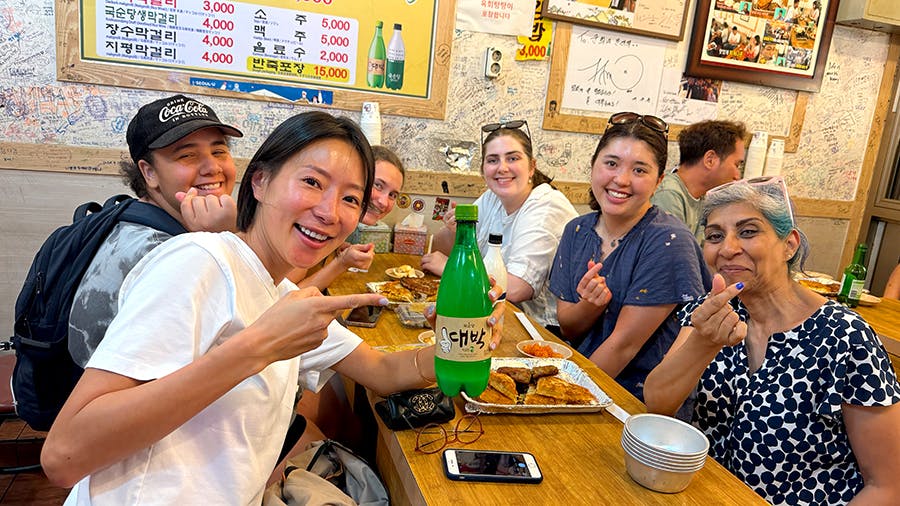 Volunteers having meal together at their free time during volunteering