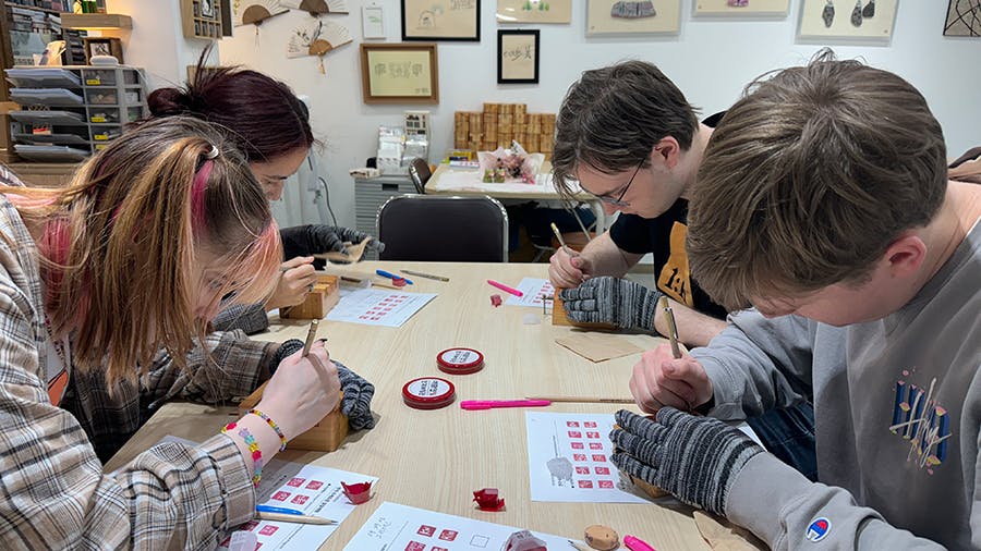 Volunteers making stamp at IVHQ Culture week volunteering in Seoul, South Korea