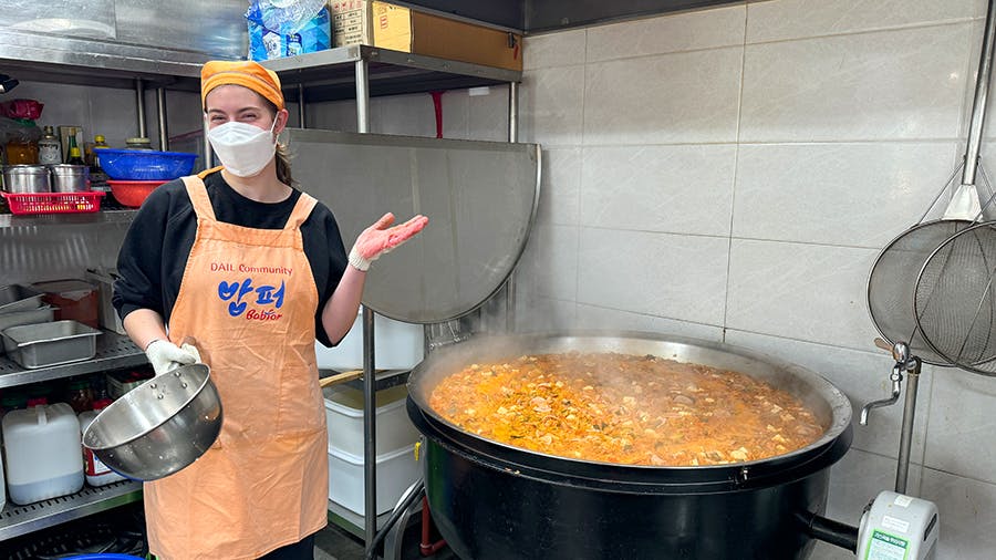 IVHQ Volunteer showing the food they made for people at the Soup Kitchen volunteer project in Seoul, South Korea
