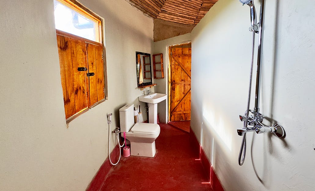 IVHQ Maasai Cultural Immersion project volunteer huts in Tanzania