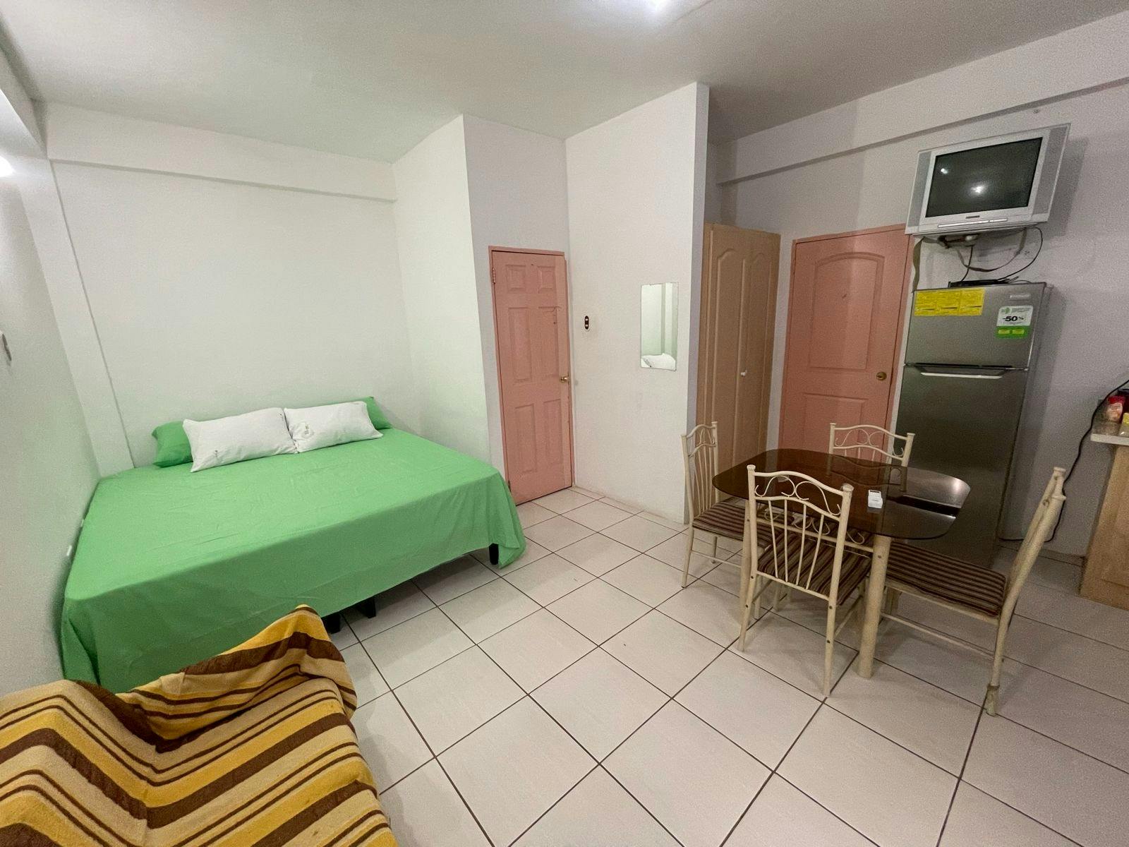 Trinidad and Tobago accomodation add on upgraded studio room with a king size bed for IVHQ volunteers