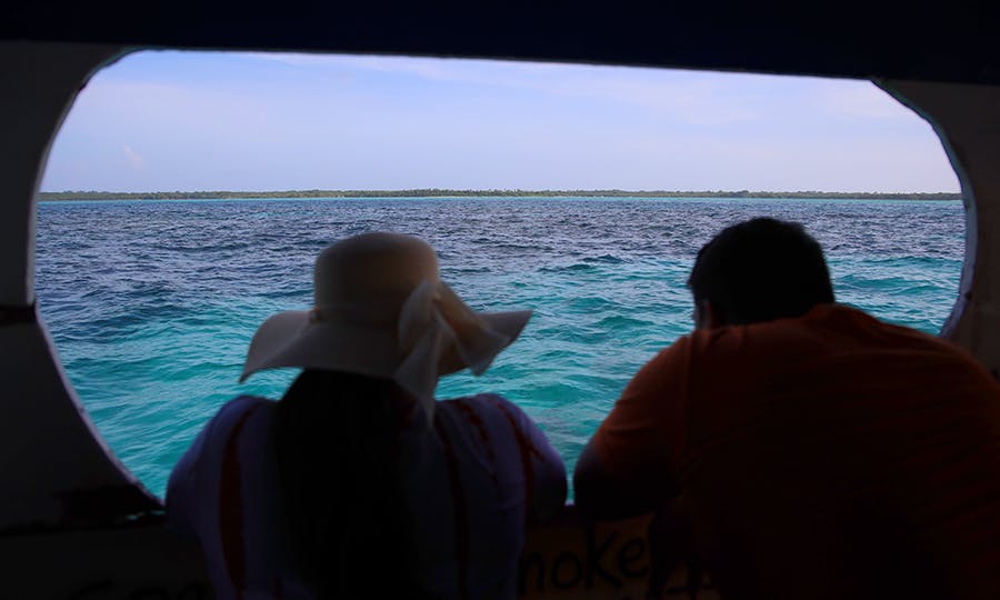 Volunteers enjoying the view on the IVHQ add on boat tour in Trinidad and Tobago