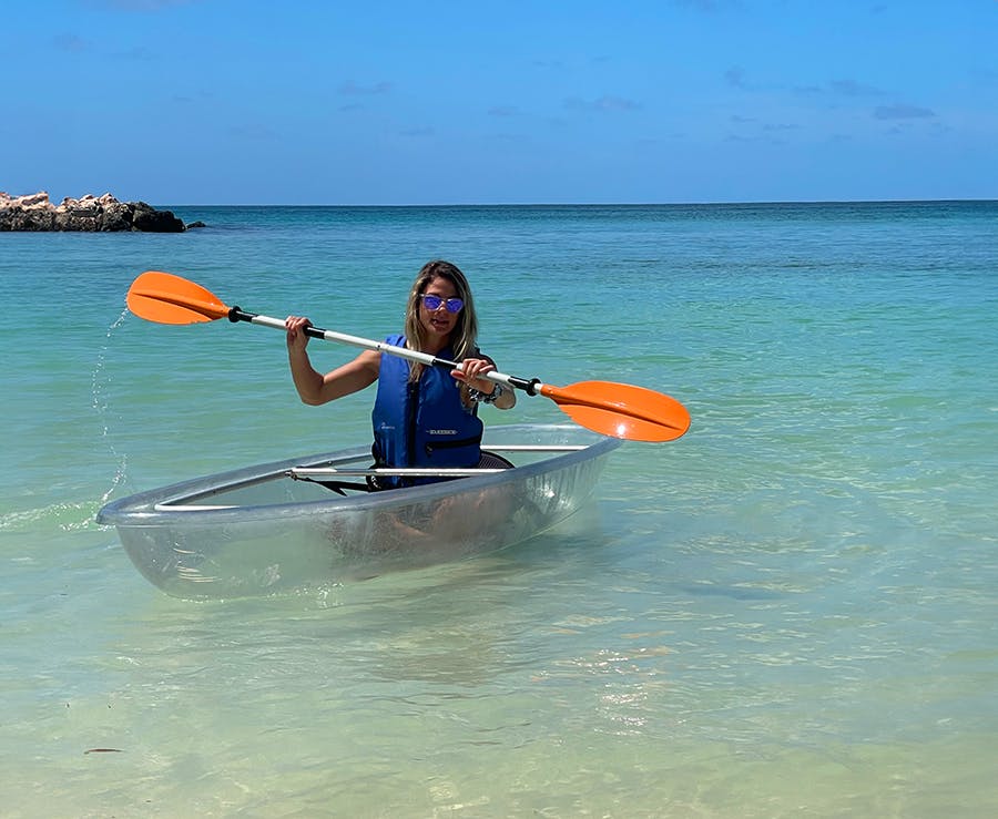 IVHQ volunteers on clear kayak in Trinidad and Tobago through IVHQ add on experience