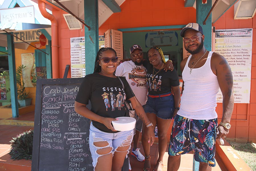 Volunteers getting a meal at their free time with others in Trinidad and Tobago with IVHQ